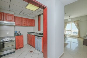 Apartment, 2 Bedrooms | Private kitchen | Fridge, microwave, oven, stovetop - Kennedy Towers - Icon Tower (Dubai)