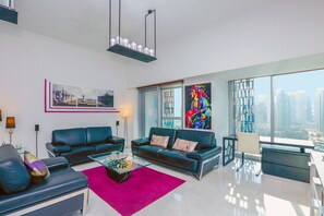 Apartment, 1 Bedroom | Living area | TV - Kennedy Towers - Cayan Tower (Dubai)