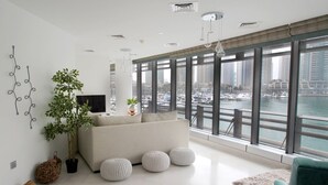 Apartment, 1 Queen Bed, Pool Access | Living area - Kennedy Towers - Cayan Tower (Dubai)
