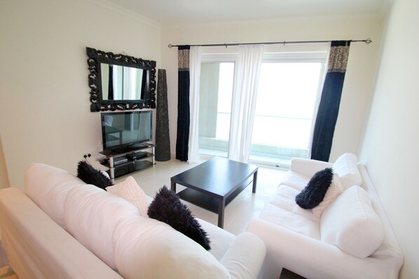 Apartment, 1 Bedroom | Living area | TV