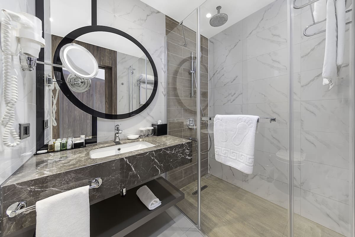 shower, eco-friendly toiletries, hair dryer, slippers
