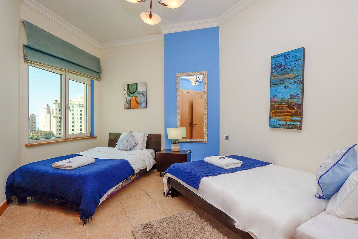 Appartement, 2 chambres | Coffre-fort, rideaux d’obscurcissement, fer et planche à repasser