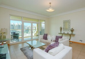 Apartment, 2 Bedrooms | Living area | TV - Kennedy Towers - Al Tamr (Dubai)