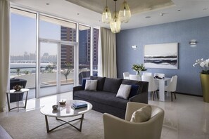 Apartment, 1 Bedroom, Sea View | Living area | TV