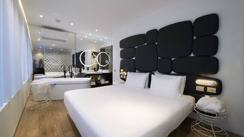 Premium bedding, down duvets, minibar, in-room safe