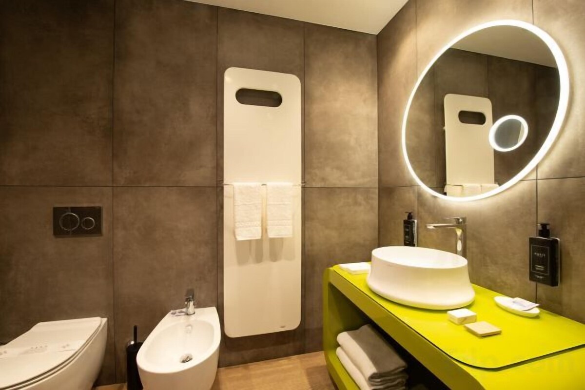 Gratis toiletartikelen, een haardroger, badjassen, pantoffels