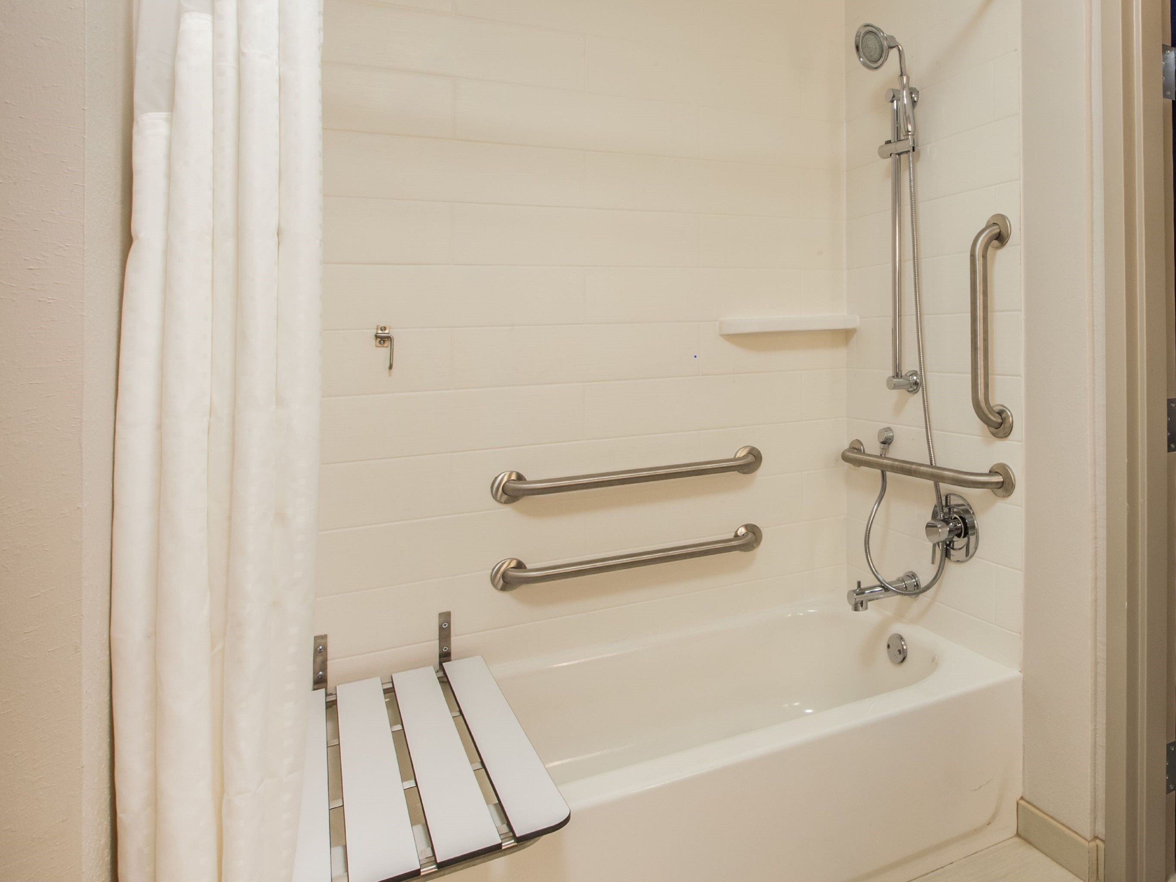 desk, blackout curtains, iron/ironing board, cots/infant beds