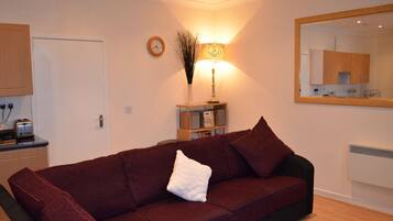 Apartment, 1 Bedroom (Mar, first floor apartment) | Living room | Flat-screen TV