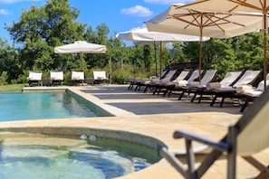 Outdoor pool, pool umbrellas, pool loungers