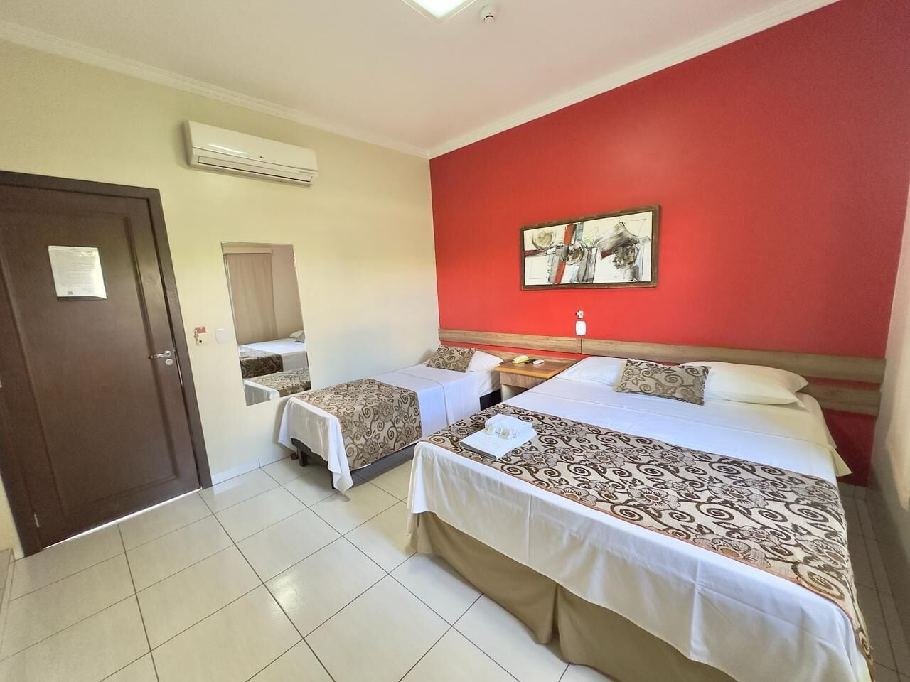 Deluxe Double Room, 1 Queen Bed | Minibar, individually decorated, desk, blackout drapes