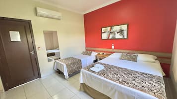 Deluxe Double Room, 1 Queen Bed | Minibar, individually decorated, desk, blackout drapes