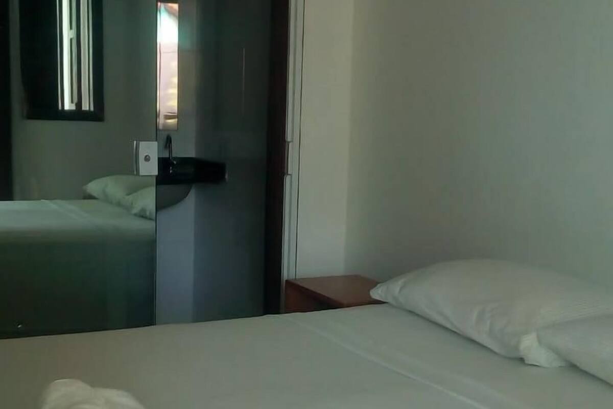 Desk, blackout drapes, bed sheets