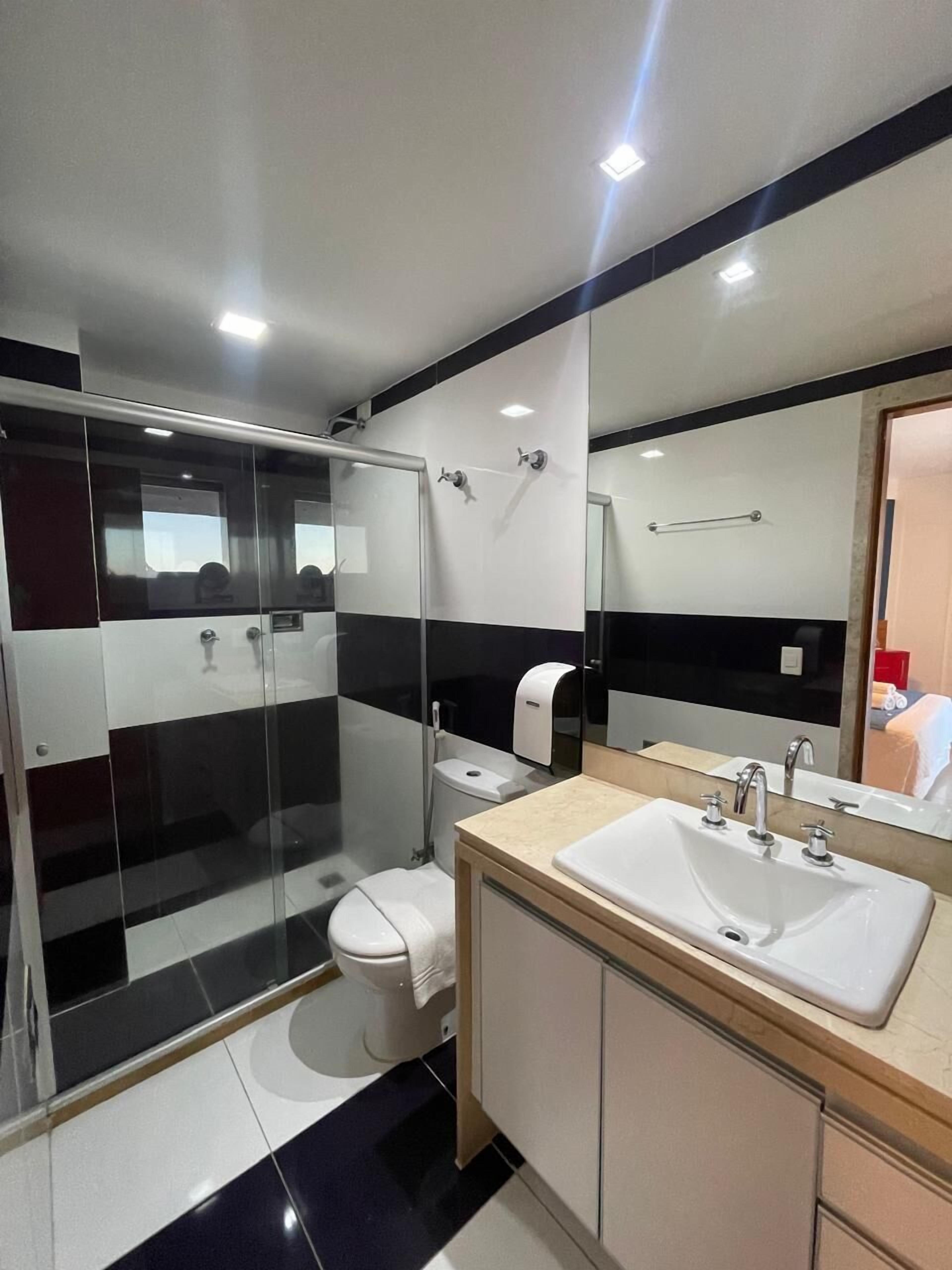 suite, 1 double bed, patio | bathroom | shower, designer toiletries, hair dryer, towels
