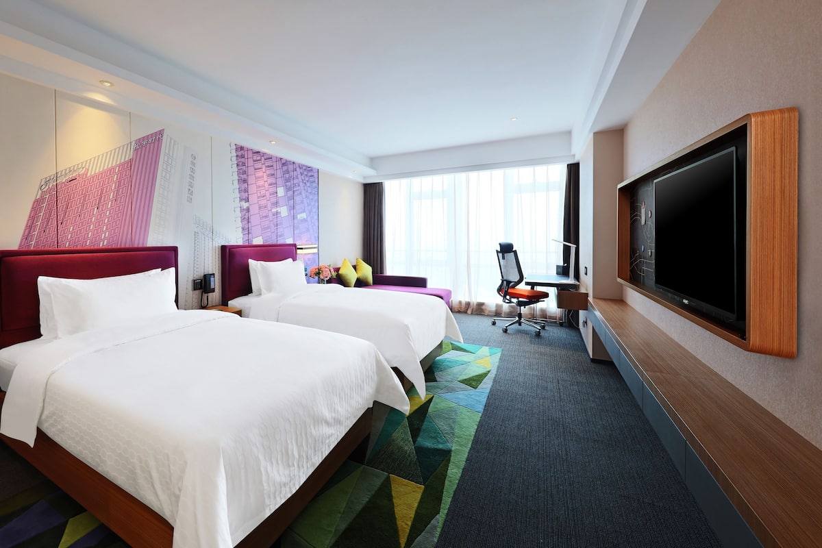 Superior Twin kamer | Luxe beddengoed, een minibar, een bureau, verduisterende gordijnen