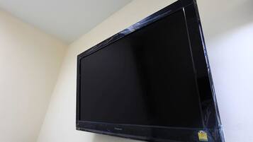 A flat-screen television mounted on a wall.
