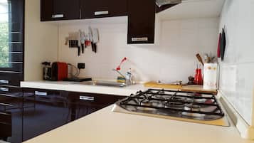 Apartament, 1 dormitori | Cuina privada | Frigorífic gran, microones, forn i placa de cuina