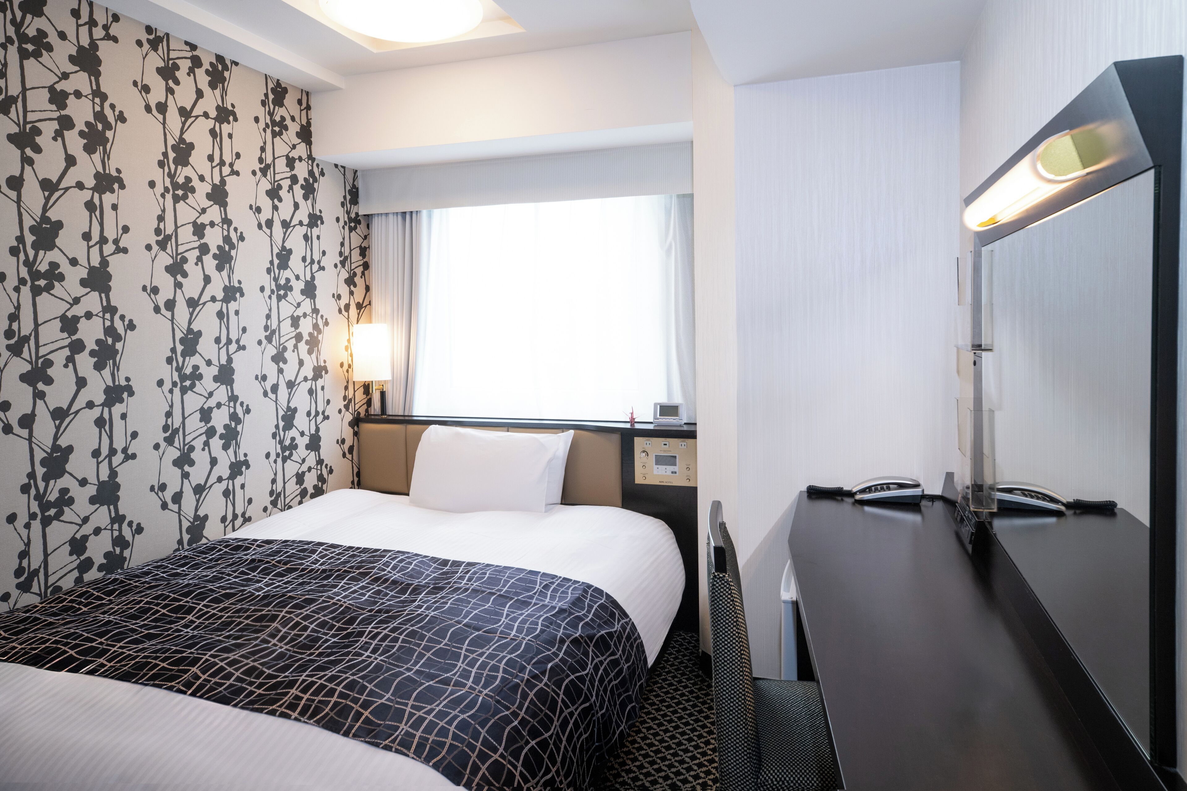 Down comforters, desk, blackout drapes, soundproofing