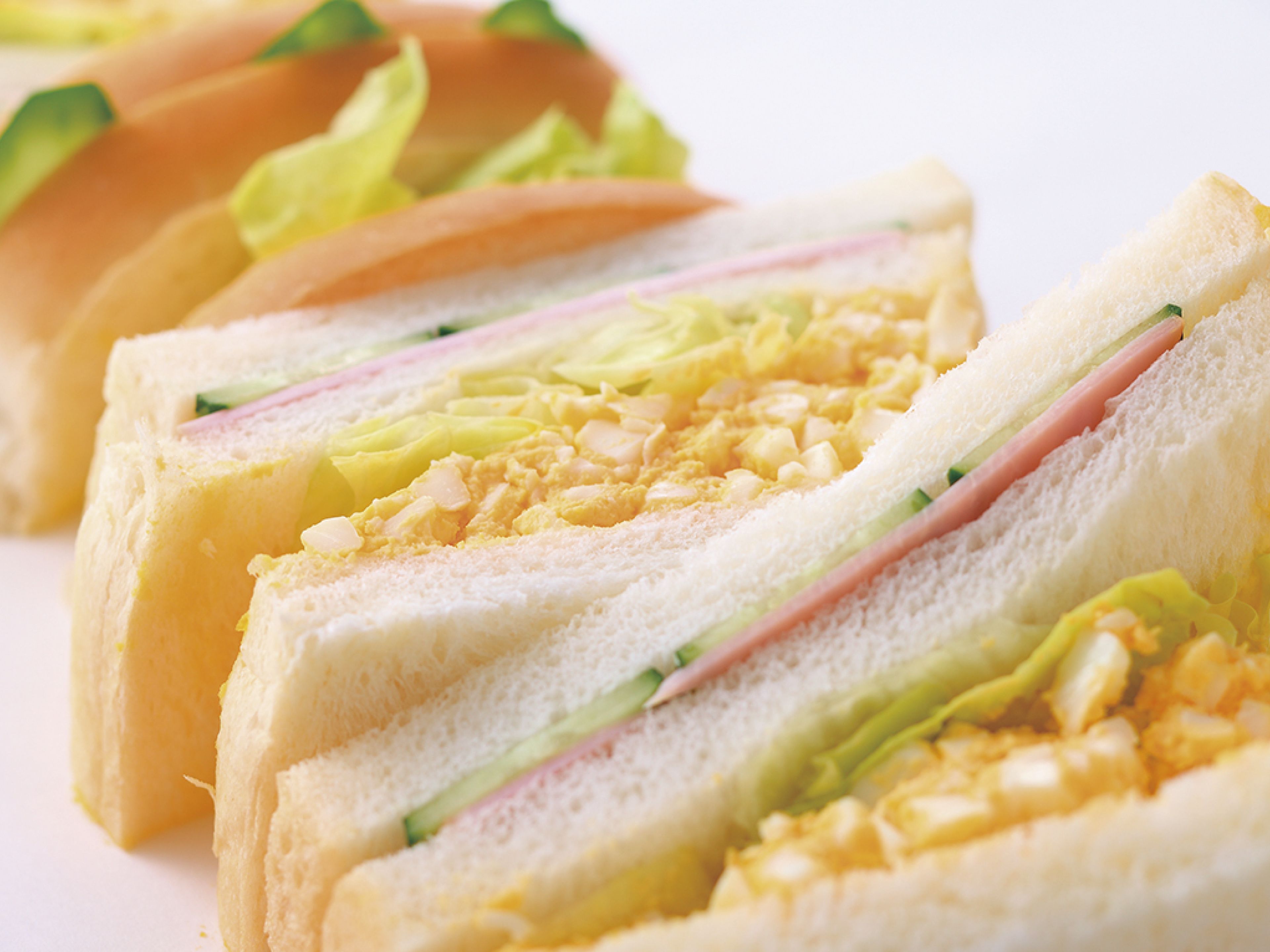 A sandwich with layers of ingredients.