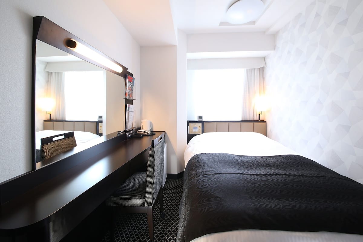 Down duvets, desk, blackout curtains, soundproofing