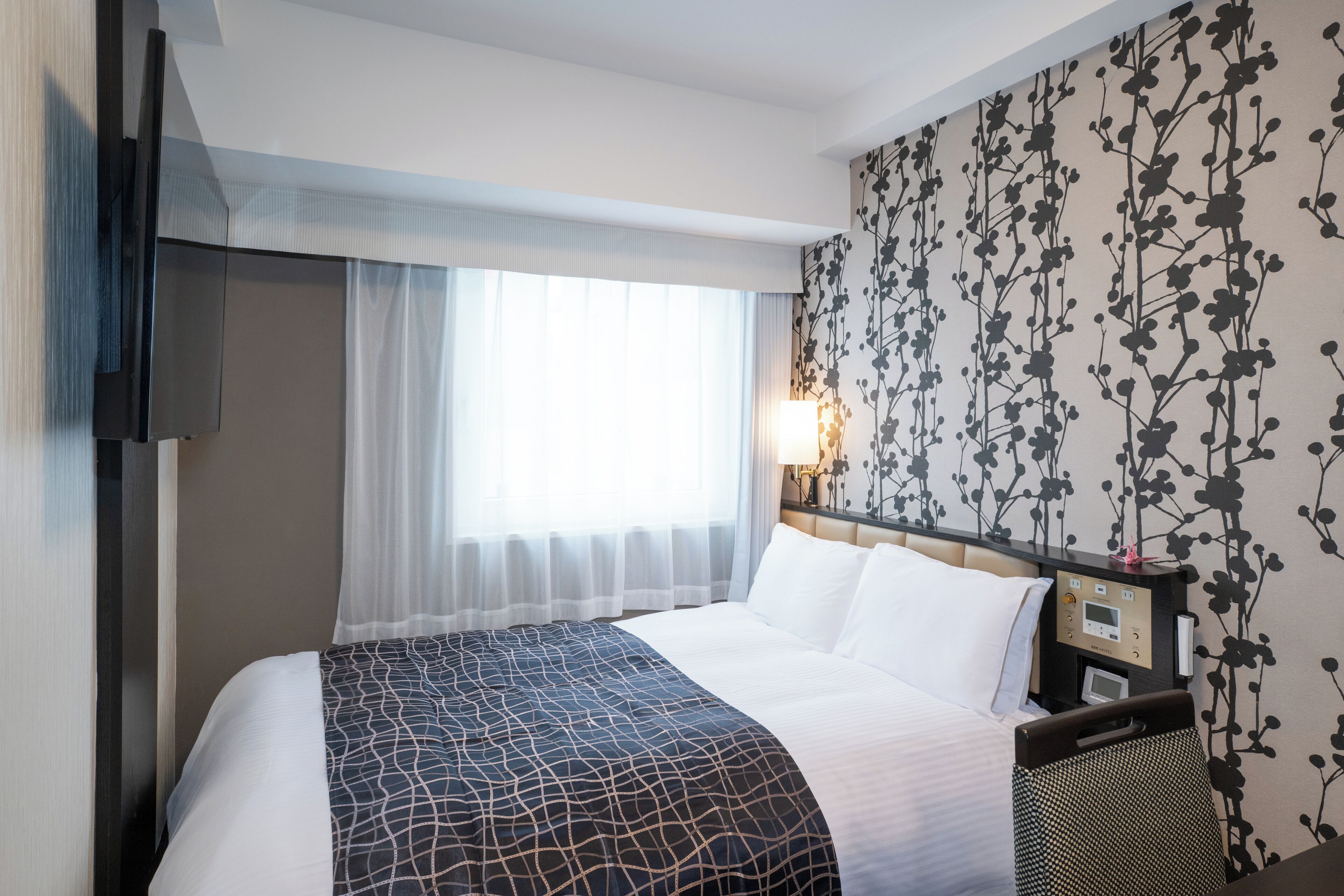 Down comforters, desk, blackout drapes, soundproofing