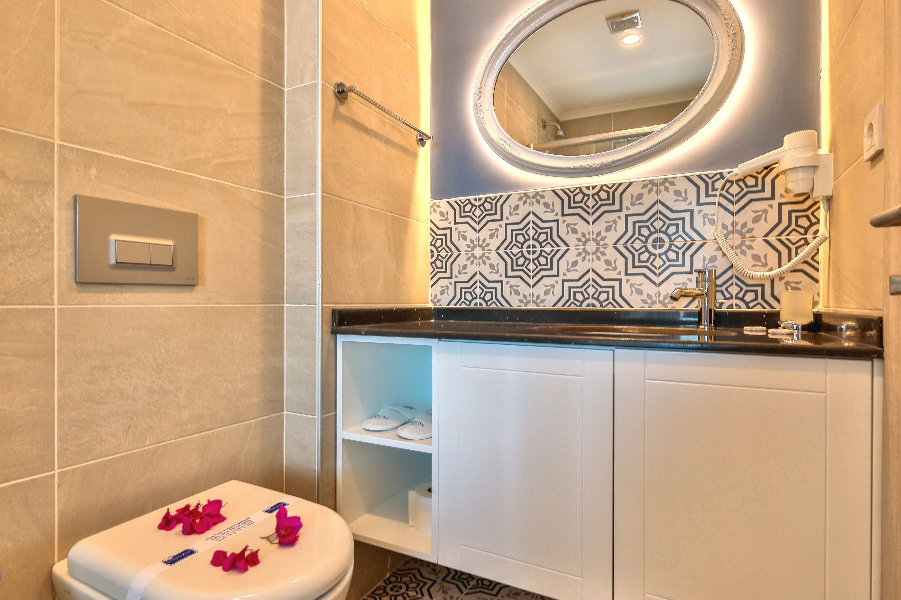 shower, free toiletries, hair dryer, slippers