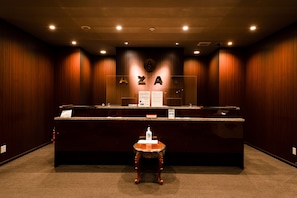 Welcome to AZAT, where guests can check in at the central reception desk.