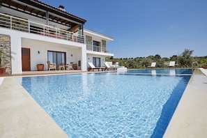 Outdoor pool, pool umbrellas, pool loungers