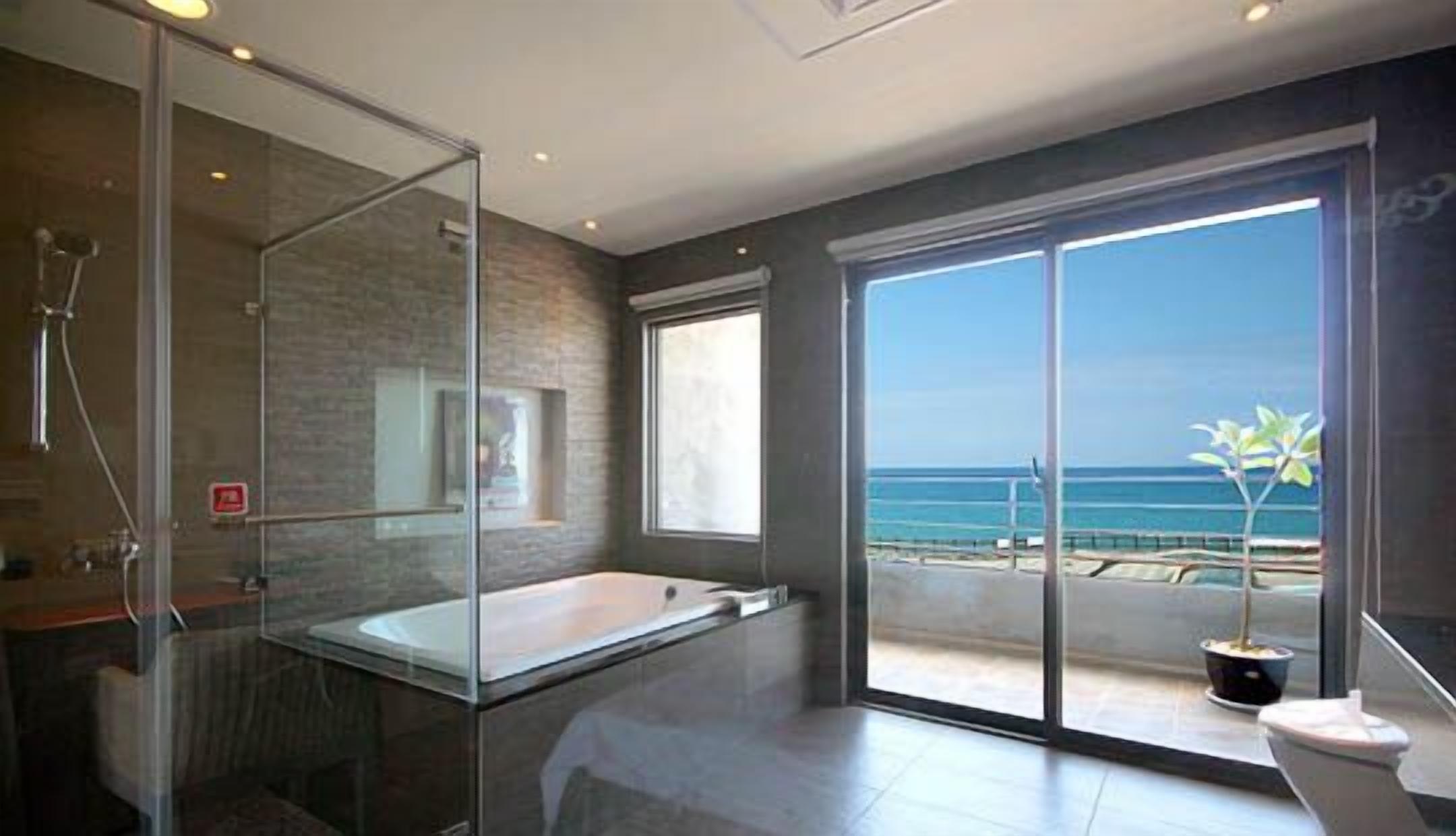 standard double room, ocean view (room2) | bathroom | separate bathtub and shower, deep-soaking bathtub, rainfall showerhead