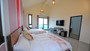 A hotel room with two beds, a desk, a TV, and a large window. - Psminshuku (Ji'an)