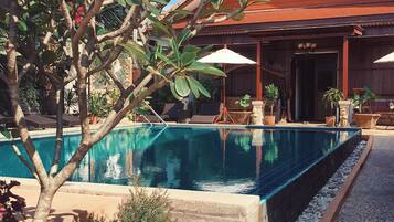 Outdoor pool, pool umbrellas, pool loungers