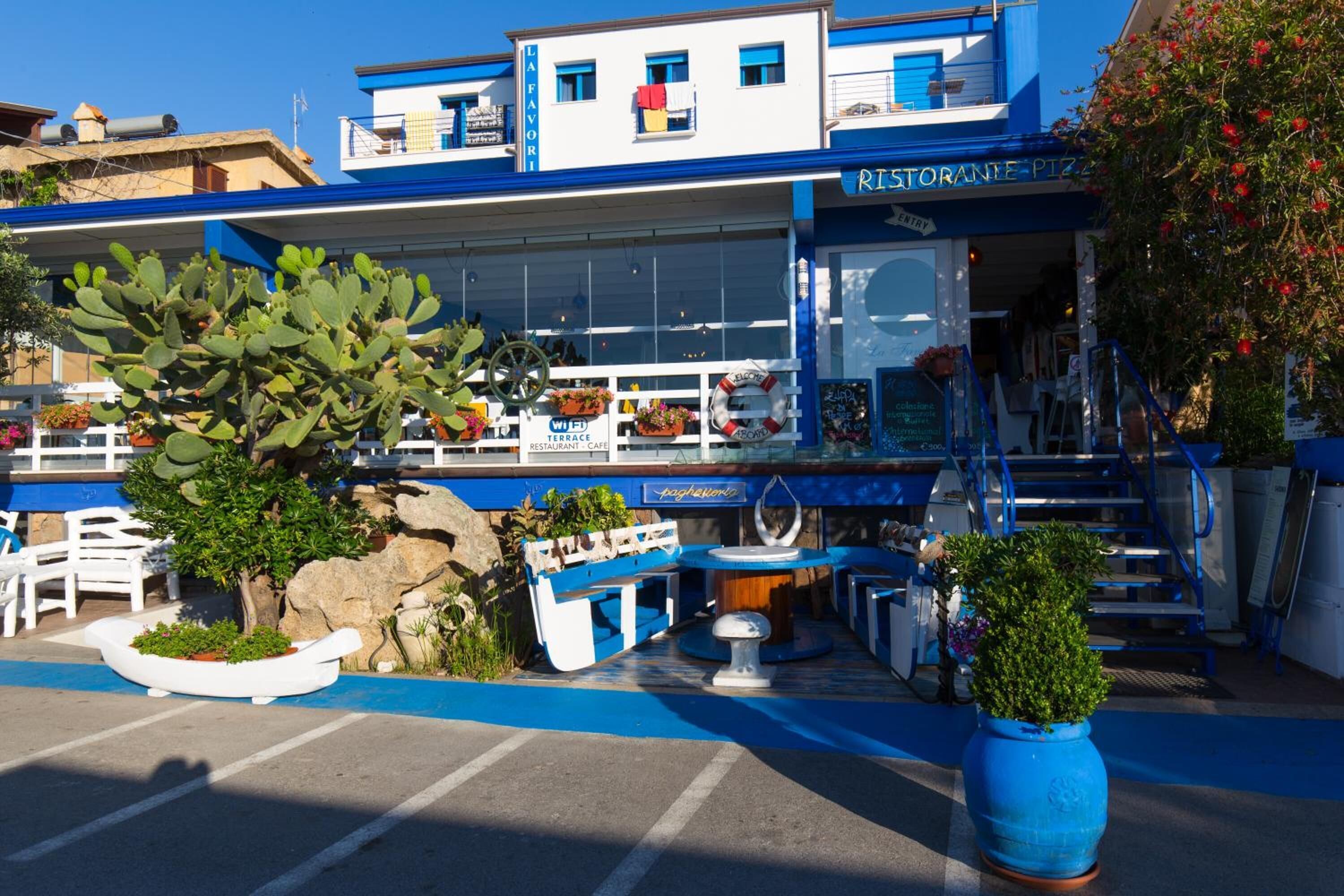 breakfast, lunch, dinner served; local cuisine