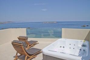 Deluxe Studio Suite, 2 Double Beds, Oceanfront | Terrace/patio - Christina Beach (Chania)