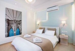 Apartment, 1 Bedroom, Ground Floor | Pillowtop beds, in-room safe, soundproofing, iron/ironing board - Christina Beach (Chania)