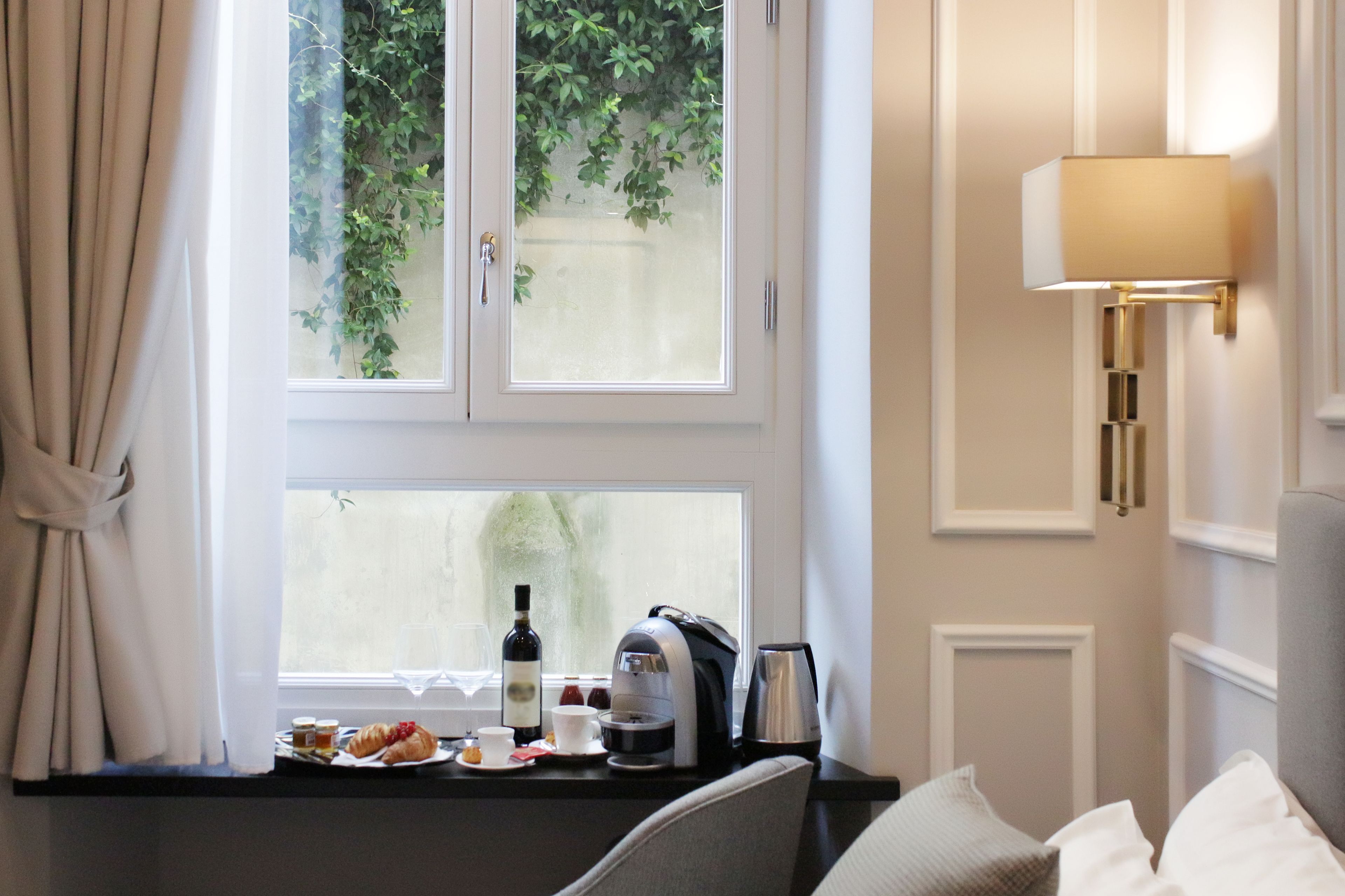 Premium bedding, laptop workspace, soundproofing, iron/ironing board