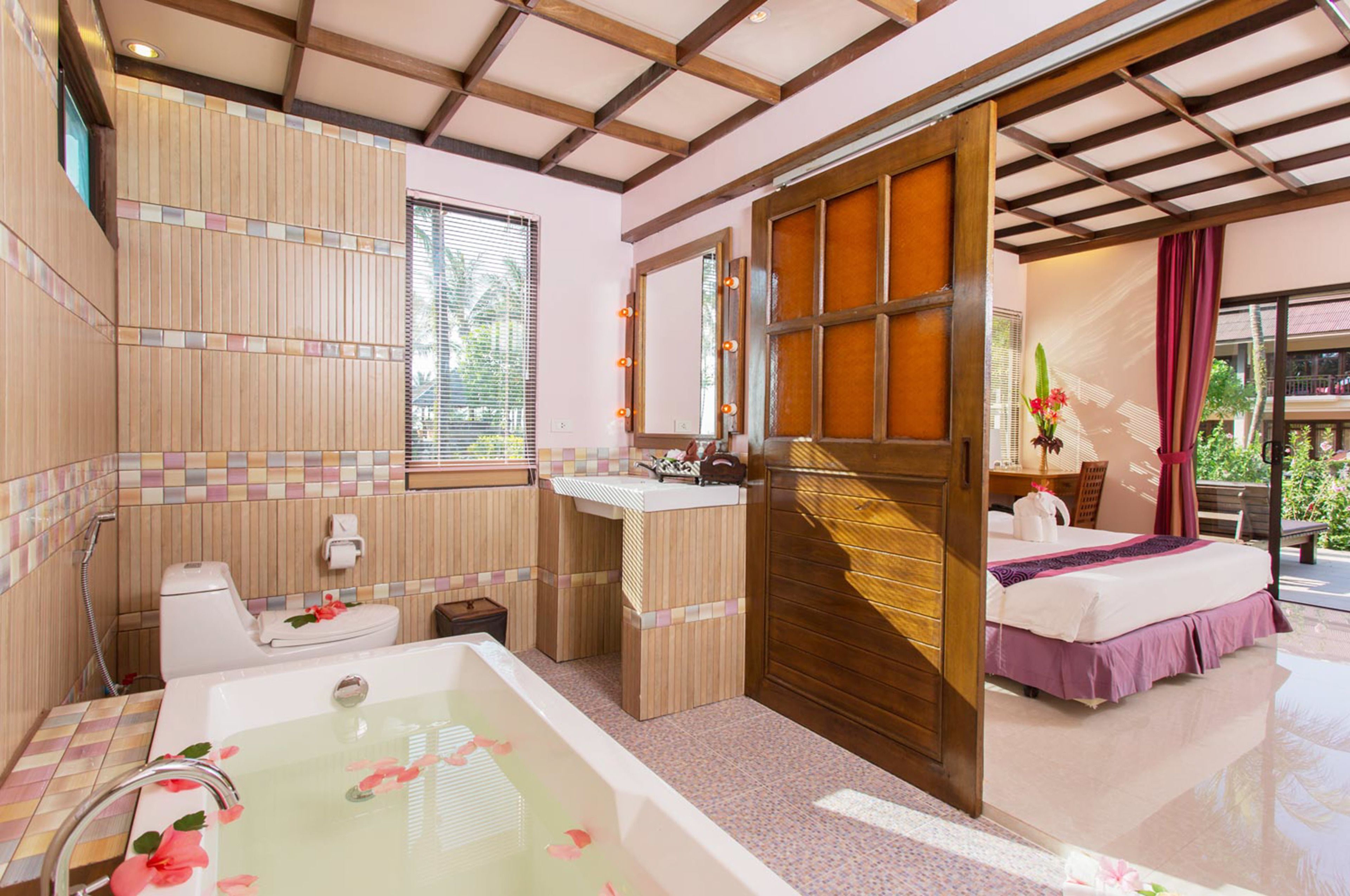 garden view bungalow | bathroom | separate bathtub and shower, deep-soaking bathtub, rainfall showerhead