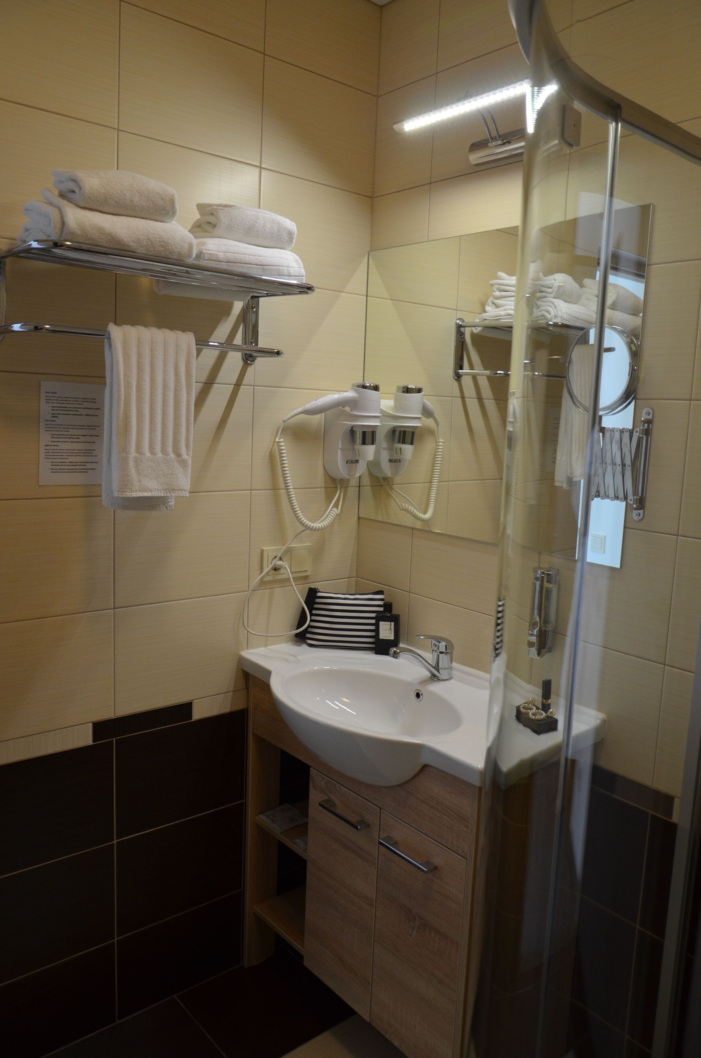 shower, free toiletries, hair dryer, towels