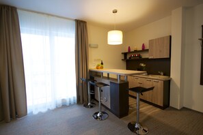 Apartament | Zona de menjador de l'habitació