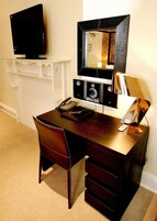 Individually decorated, individually furnished, desk, blackout drapes