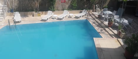 Outdoor pool, pool umbrellas, pool loungers