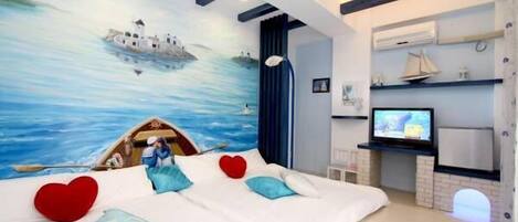 Standard Quadruple Room | Individually decorated, individually furnished, desk, blackout drapes