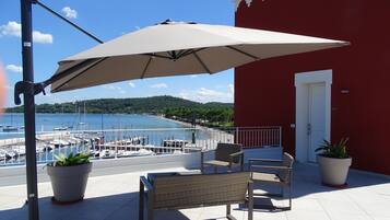 Panoramic Suite, 1 Queen Bed, Lake View, Tower | Terrace/patio