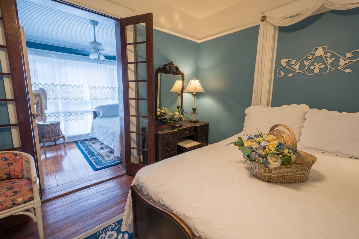 Double Room, Multiple Beds, Private Bathroom | Iron/ironing board, individually decorated, bed sheets