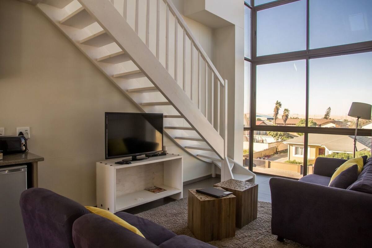 2 Bedroom Deluxe Dune View | Living area | 42-inch flat-screen TV with satellite channels, TV