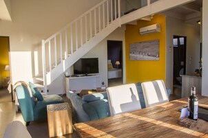 3 Bedroom Deluxe Dune View | Living area | 42-inch flat-screen TV with satellite channels, TV