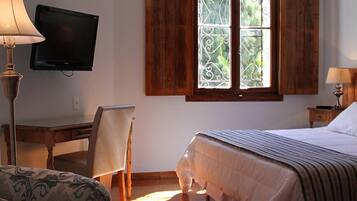 Minibar, desk, laptop workspace, blackout curtains