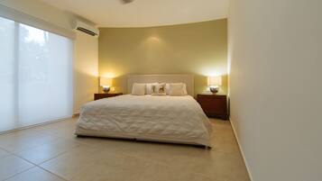 Deluxe Condo, 2 Bedrooms, Terrace, Pool View | 1 bedroom, in-room safe, iron/ironing board, WiFi (free)
