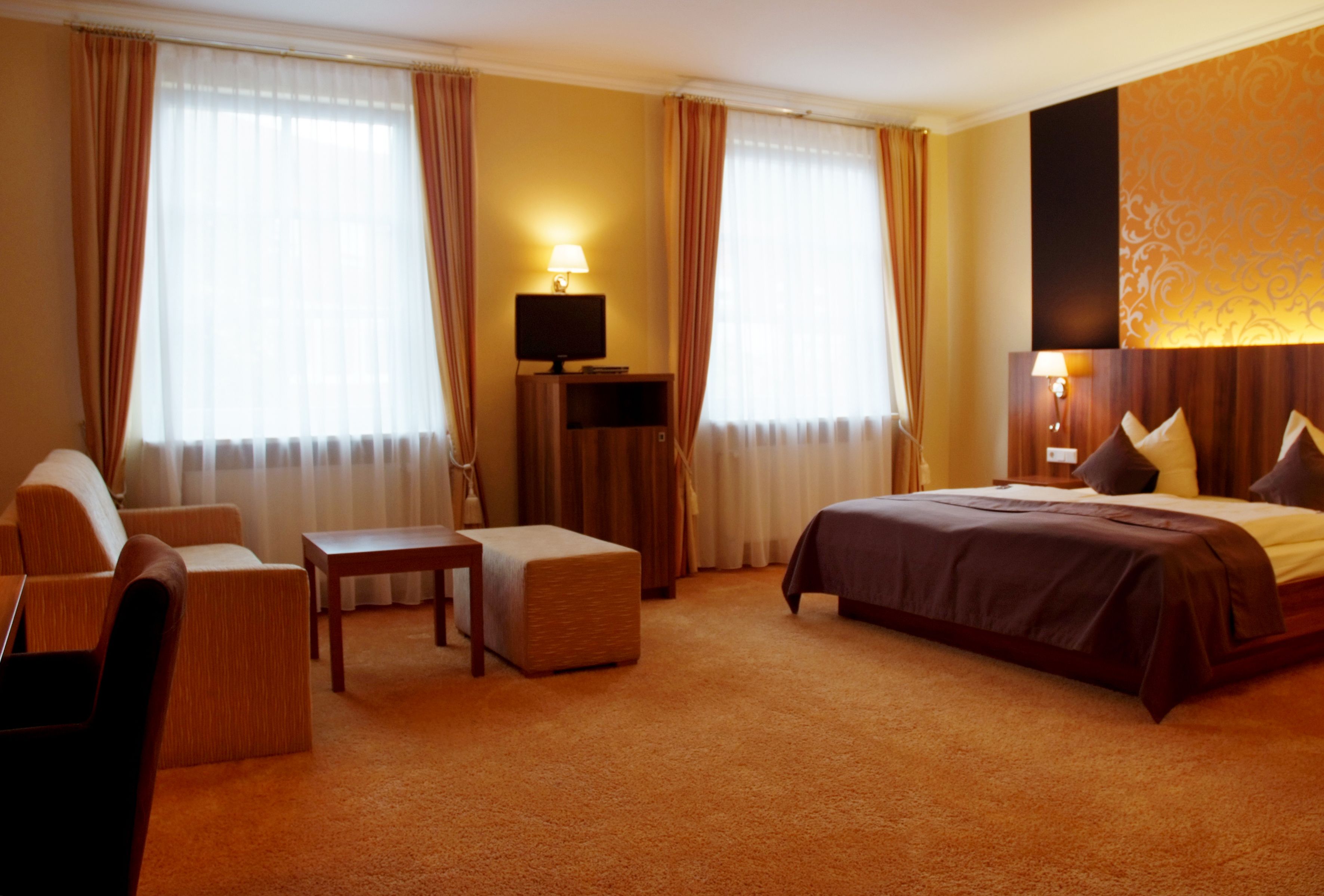 deluxe double room, 1 king bed | in-room safe, desk, soundproofing, iron/ironing board