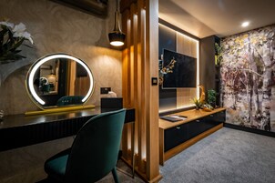 Superior Suite, Ground Floor | Living area | 26-inch flat-screen TV with digital channels, TV