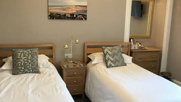 Blackout curtains, iron/ironing board, free WiFi, bed sheets