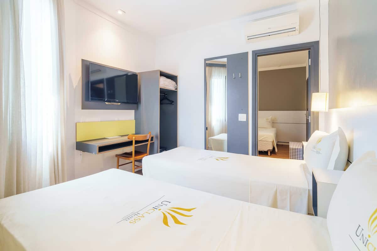 Standard Quadruple Room | Minibar, desk, free WiFi, bed sheets